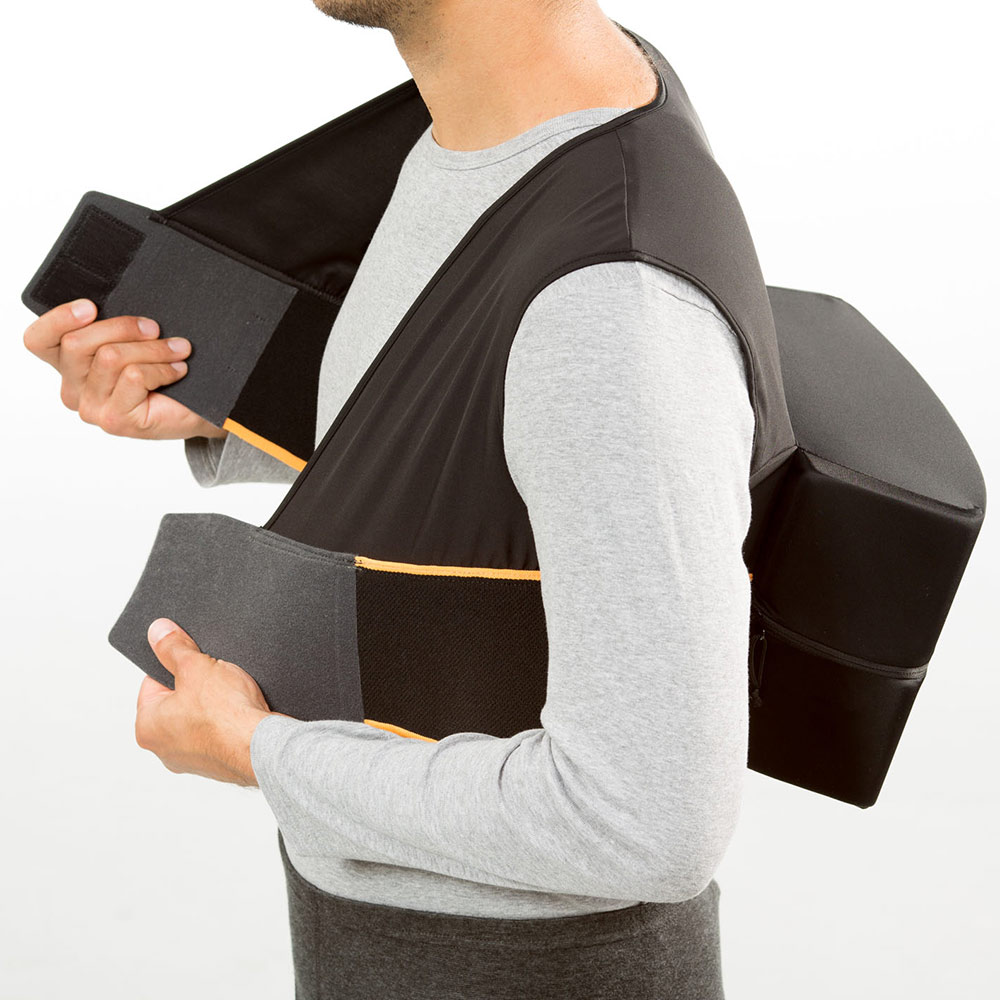 Positional therapy vest to stop you sleeping (and snoring) on your back. Showing the velcro fastener.